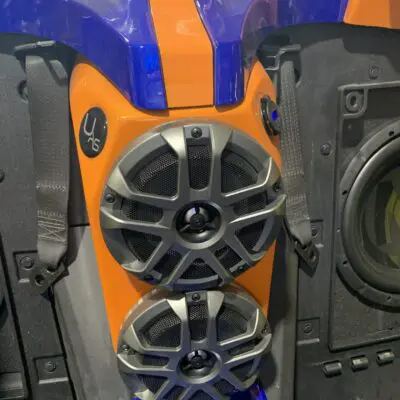 Blue and orange mount with speakers