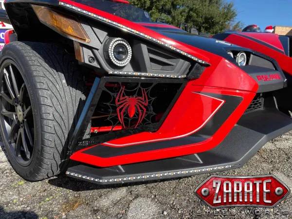 A black and red Slingshot bumper with a Spiderman logo