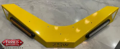 A yellow metal object with a corner