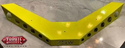 A yellow and cornered metal object