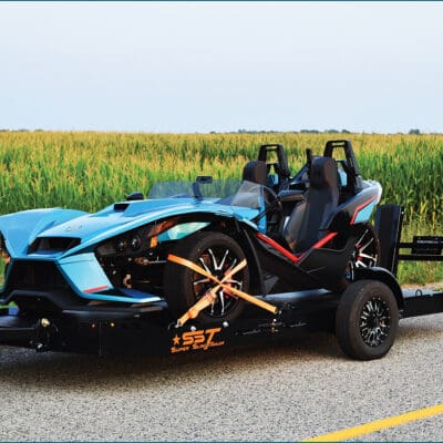 Introducing the SST Super Sling, your ultimate towing solution crafted exclusively for 2015 or newer Polaris Slingshots. Engineered with robust all-steel construction and a sleek black powder-coated finish, this trailer is built to endure rugged conditions with style.